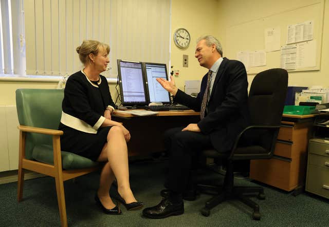 Health Secretary Shona Robison with GP Alan McDevitt (Andrew Milligan/PA)