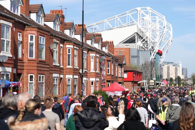 General view of fans making their way inside the stadium ahead of the Premier League match at Old Trafford