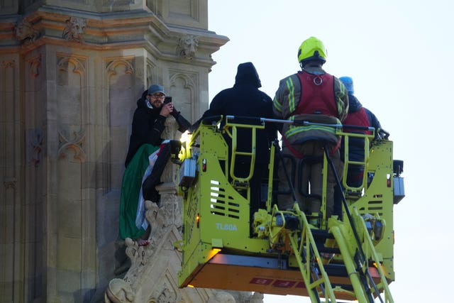 Negotiators speak to the Elizabeth Tower protester