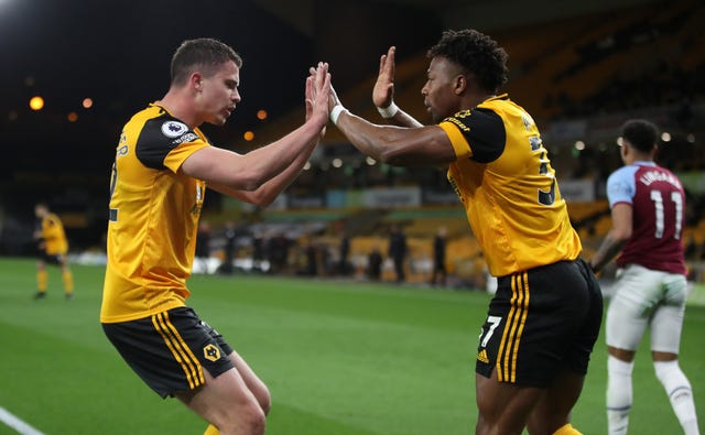 Leander Dendoncker, left, celebrates with Adama Traore after scoring against West Ham