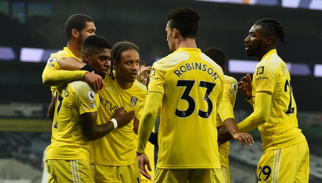 Fulham players celebrating with Ivan Cavaleiro (2nd left) after his goal.