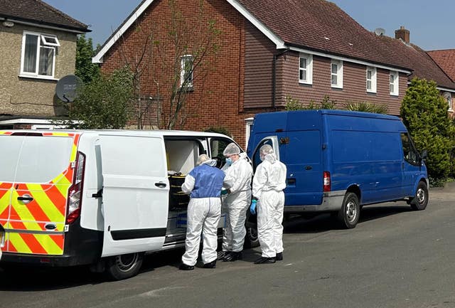 Forensic investigators at the scene in High Wycombe