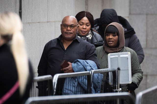 Helen Lumuanganu (second left) and Prosper Kaba (left), the mother and father of Chris Kaba, arriving at the Old Bailey during Mr Blake's trial 