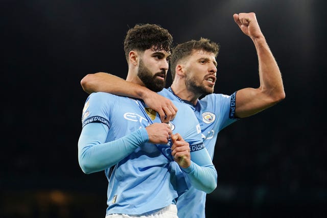 Manchester City’s Josko Gvardiol celebrates scoring a goal with Ruben Dias