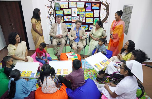 The Princess Royal and her husband Vice Admiral Sir Timothy Laurence engage with a group of children and staff using a social-emotional learning toolkit for children during a visit to Lady Ridgeway Hospital for Children in Colombo during day one of their visit to mark 75 years of diplomatic relations between the UK and Sri Lanka