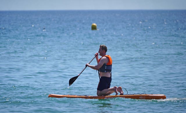 Man paddleboarding