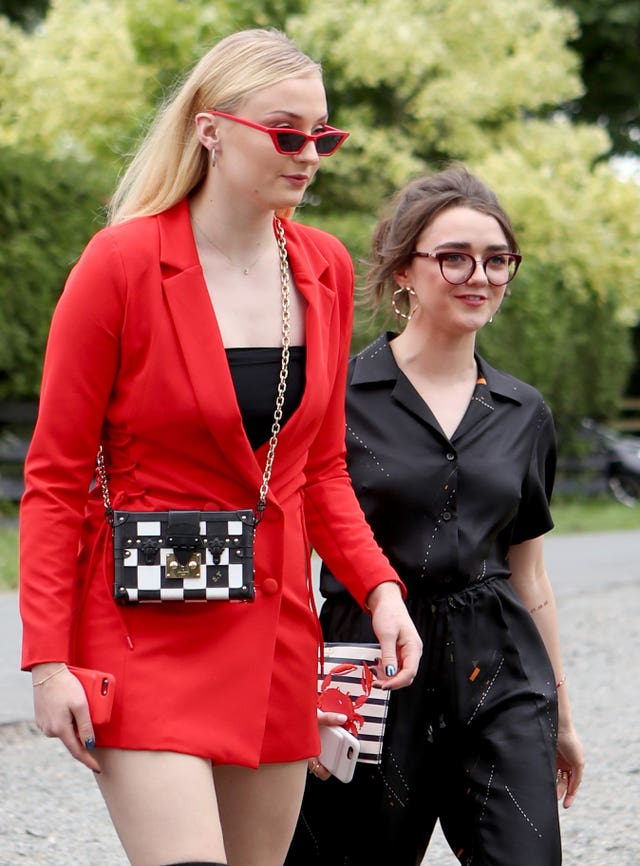 Actresses Sophie Turner (left) and Maisie Williams