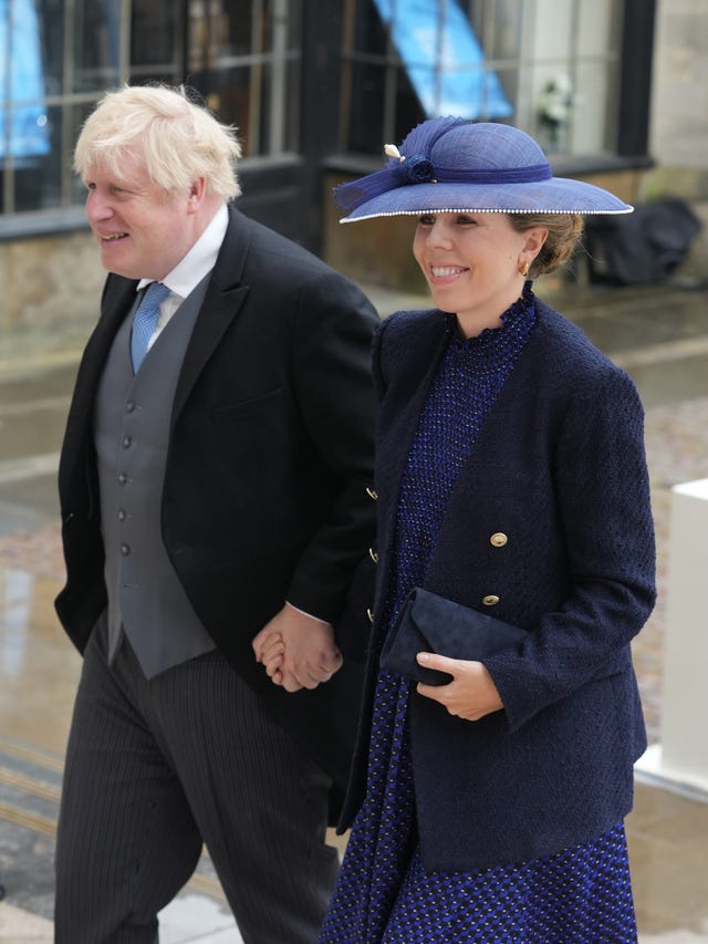 Former prime minister Boris Johnson and his wife Carrie Johnson arriving ahead of the coronation ceremony of the King (Dan Charity/The Sun/PA)