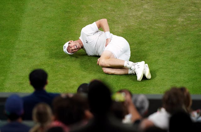 Andy Murray slips on court during his match against Stefanos Tsitsipas