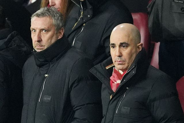 Jason Wilcox, left, and Omar Berrada, right, in the stands