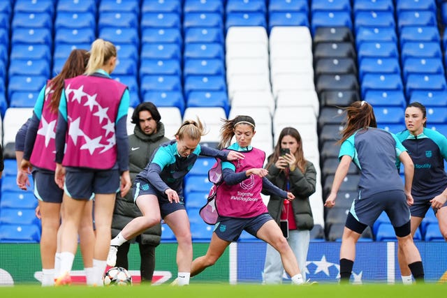 Keira Walsh, centre left, and Aitana Bonmati, centre right, in training with Barcelona