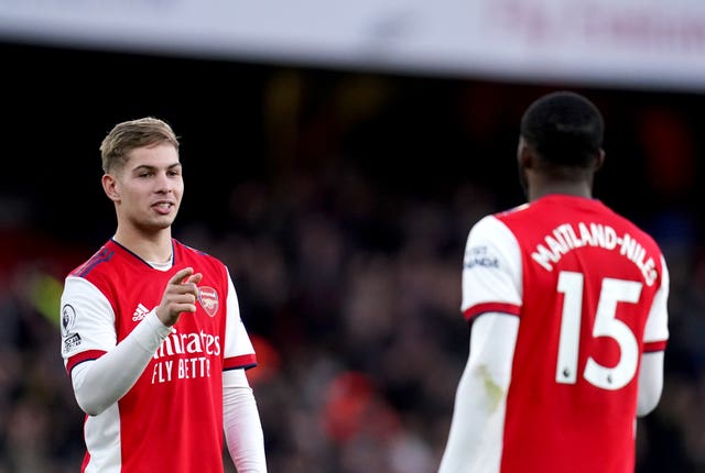 Emile Smith Rowe celebrates victory with Ainsley Maitland-Niles 