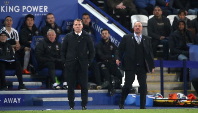 Two former Liverpool mangers in Brendan Rodgers (left) and Rafael Benitez (right) could have a say in the title run-in.