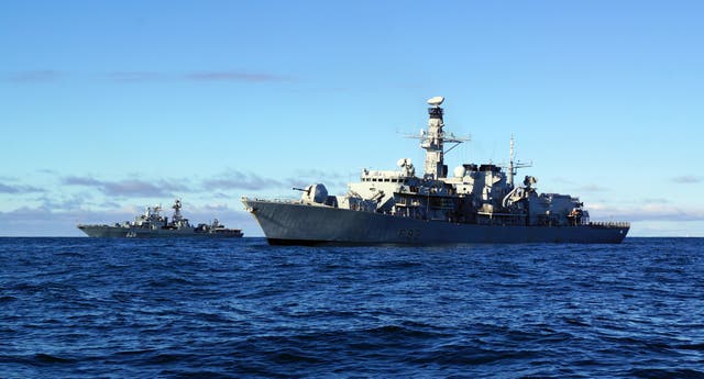 HMS Somerset (foreground) shadowing a Russian naval task group(ET Ryan Curtis/MoD/Crowm Copywright/AP)