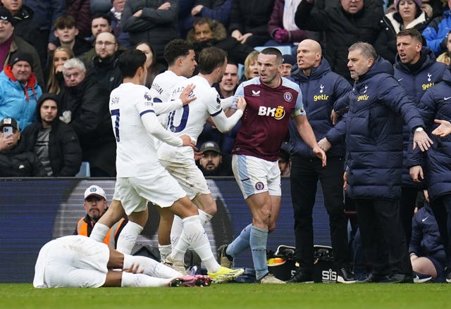 Aston Villa''s John McGinn, right, is confronted by Tottenham''s Son Heung-min, Brennan Johnson and James Maddison, from left, as Destiny Udogie lies on the ground