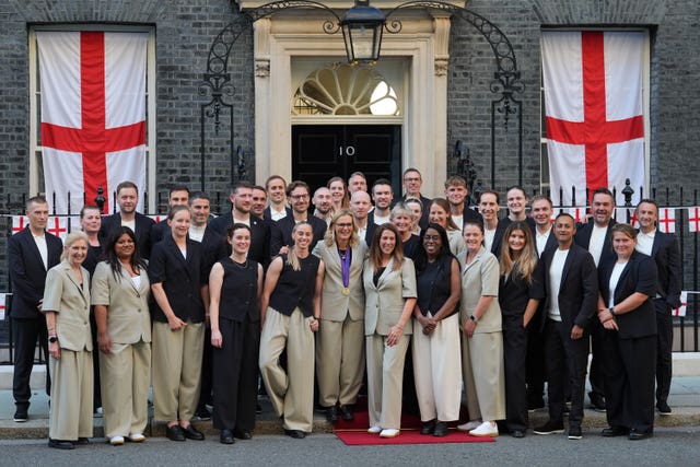 Members of the England Women’s football team pose for a photo in Downing Street