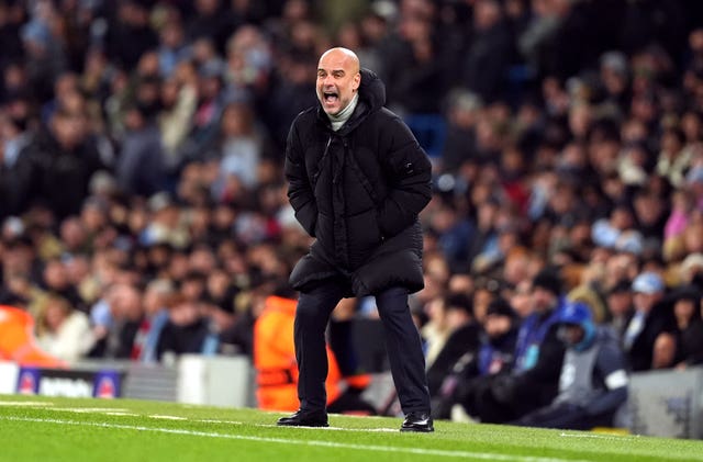 Pep Guardiola shouts during Manchester City's shock draw with Feyenoord