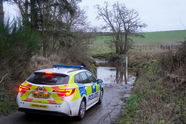 Police at the scene at River Aln near Alnwick, Northumberland