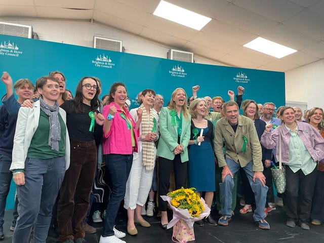 Sian Berry and Green Party supporters celebrate at the Portslade Sports Centre after winning the seat in the Brighton Pavilion constituency in the 2024 General Election