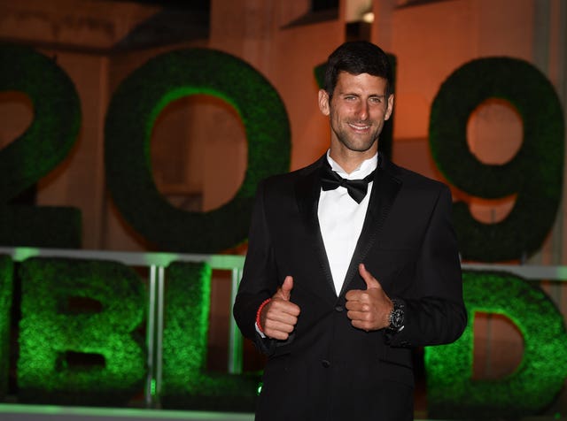 A thumbs up from Novak Djokovic as he arrives for the Champions Dinner