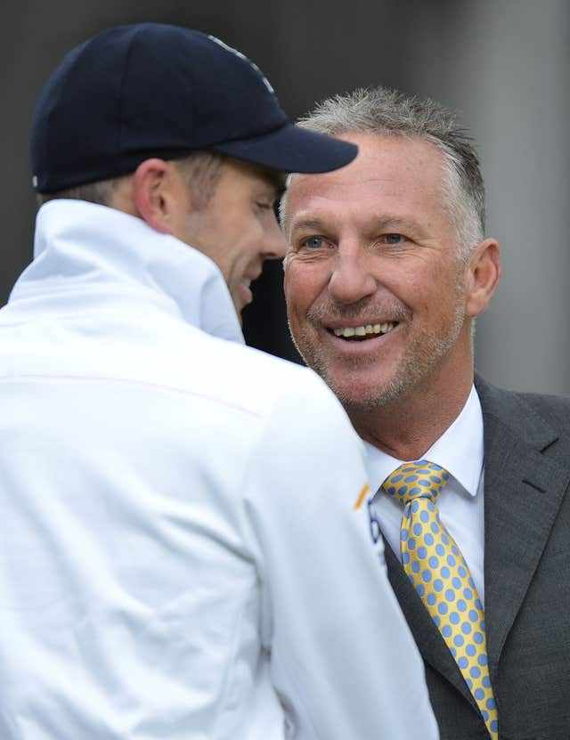 James Anderson (left) is congratulated by Ian Botham after joining him by reaching 300 Test wickets