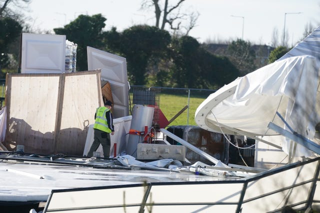 Workers at an ice skating facility in Blanchardstown which was damaged after wind tore the structure apart 