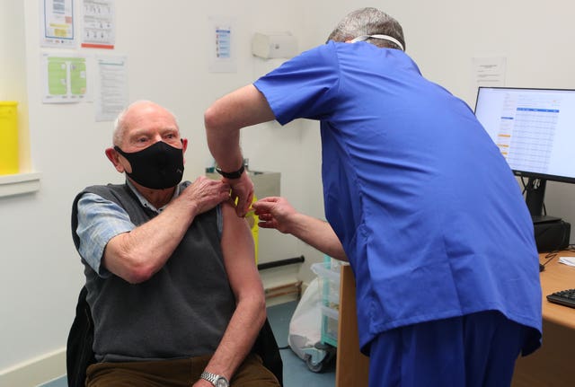 A Covid-19 vaccine being given