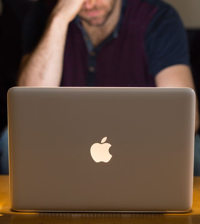 A man using a laptop