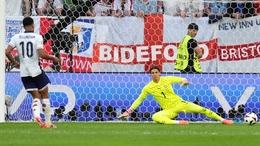 Jude Bellingham (left) scores a penalty in the penalty shoot-out (Martin Rickett/PA)