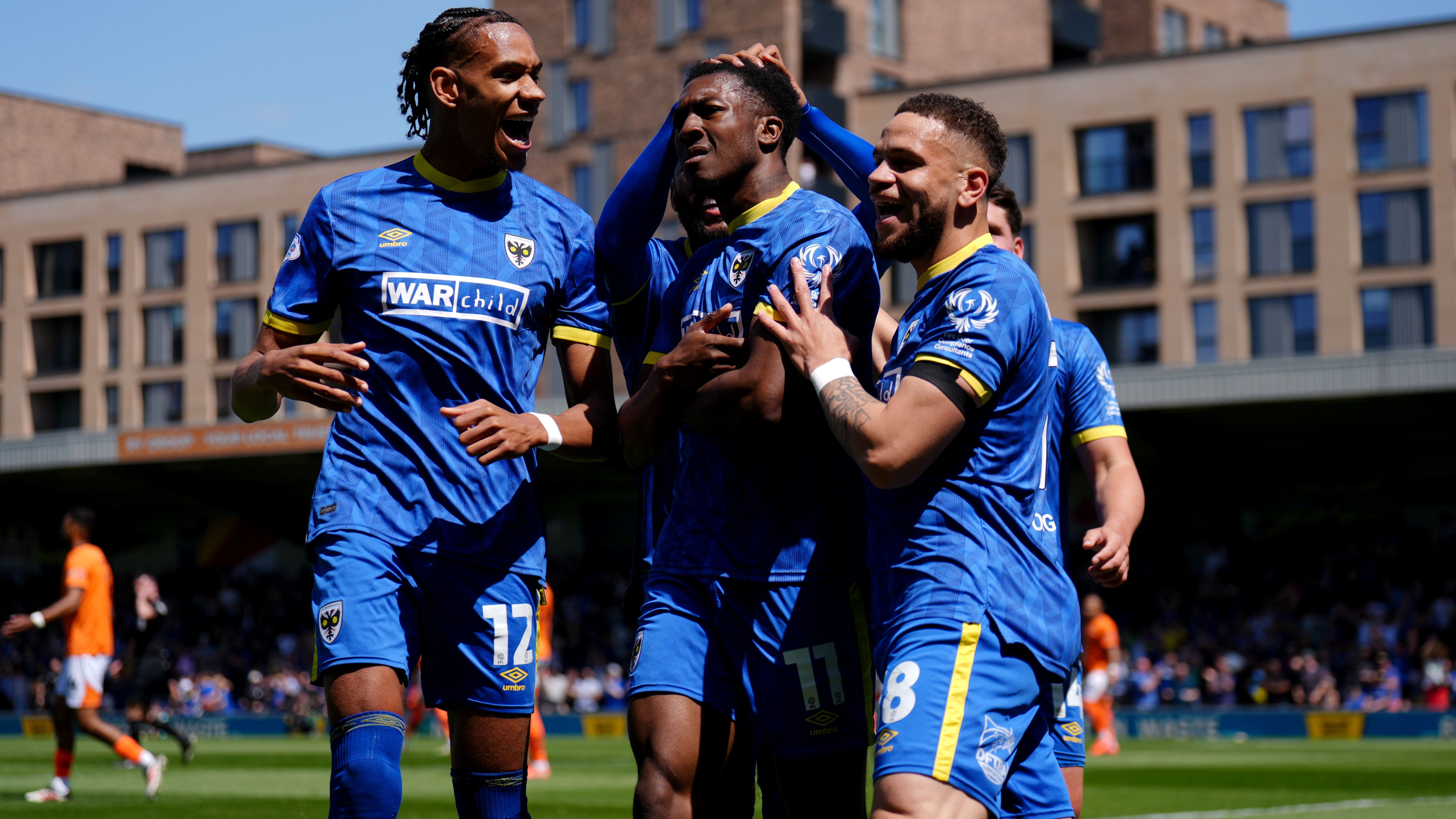 AFC Wimbledon’s Josh Neufville celebrates (John Walton/PA)