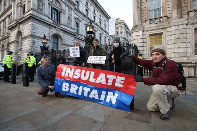 Insulate Britain supporters outside Downing Street
