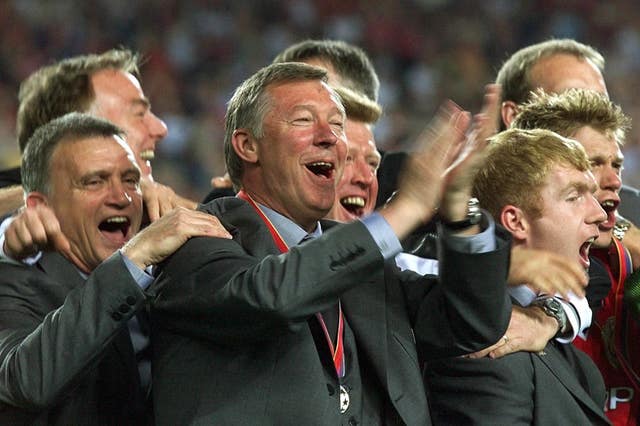 Sir Alex Ferguson celebrates the treble