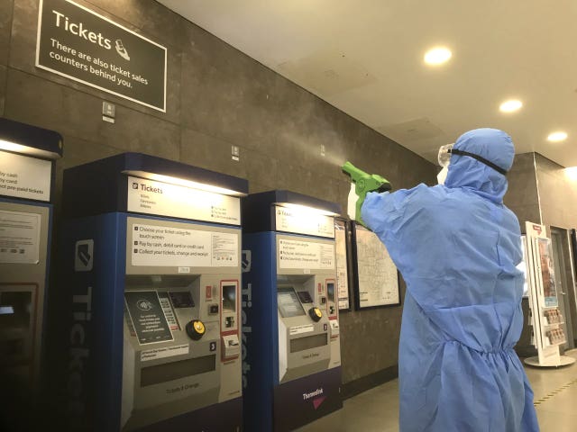 The disinfectant is applied using electrostatic spray guns (Govia Thameslink Railway/PA)