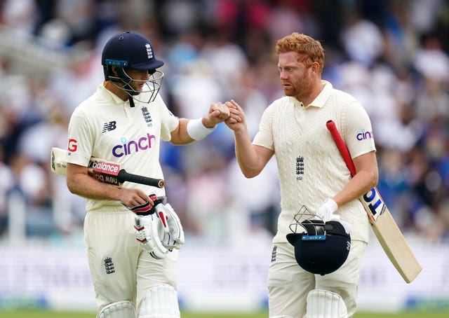 England batsmen Joe Root, left, and Jonny Bairstow walk off for lunch