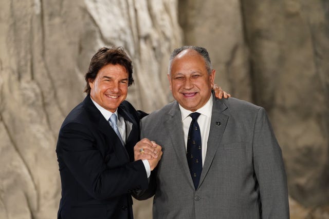 Tom Cruise with US navy secretary Carlos Del Toro 