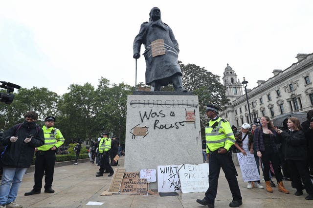 Graffiti on the Winston Churchill statue during the Black Lives Matter protest rally in Parliament Square in 2020