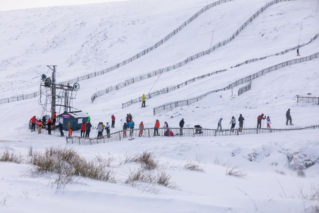 People enjoy a day of out at the Lecht Ski Centre at Strathdon in the Cairngorms, Scottish Highlands