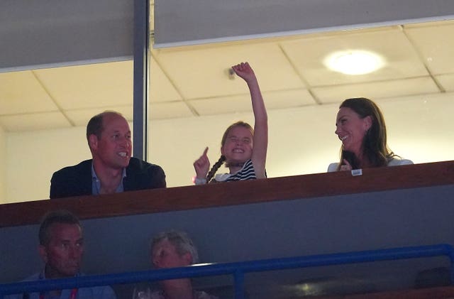 The Duke and Duchess of Cambridge with their daughter Princess Charlotte of Cambridge as they watch the gymnastics at the Arena Birmingham on day five of the 2022 Commonwealth Games in Birmingham