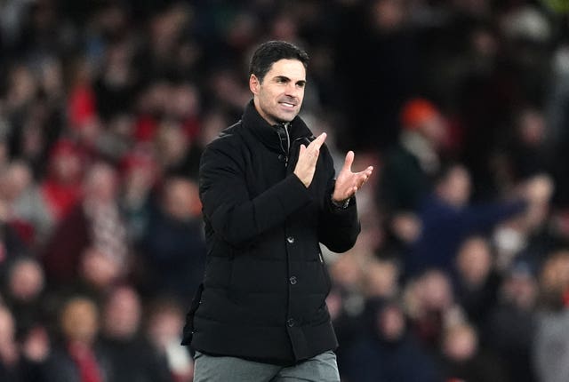 Arsenal manager Mikel Arteta applauds the fans