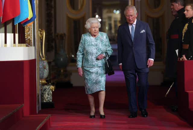 The Queen arrived for the ceremony with her son (Jonathan Brady/PA)