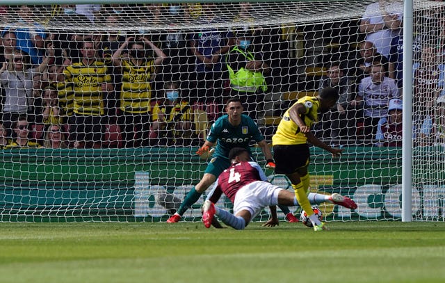 Emmanuel Dennis (right) scored Watford's first goal against Aston Villa on Saturday (Jonathan Brady/PA).