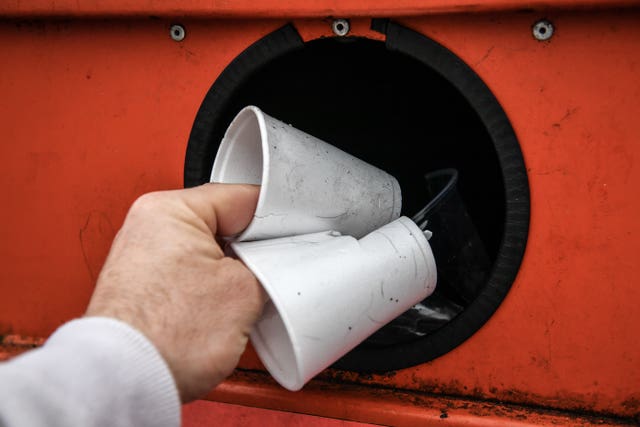 Disposable drinking cups are deposited at a plastic recycling centre s 