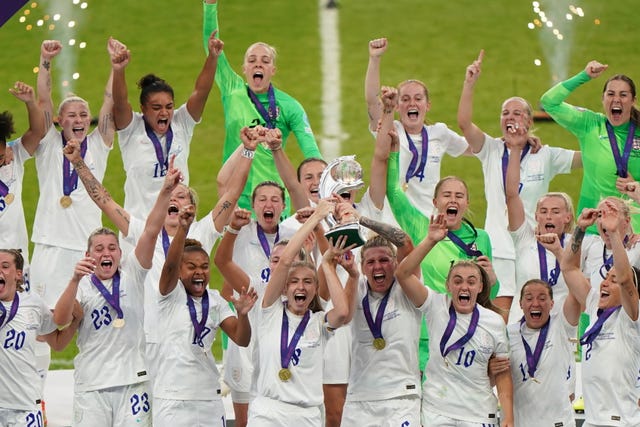 England’s players celebrate after their historic Euros win (Joe Giddens/PA).