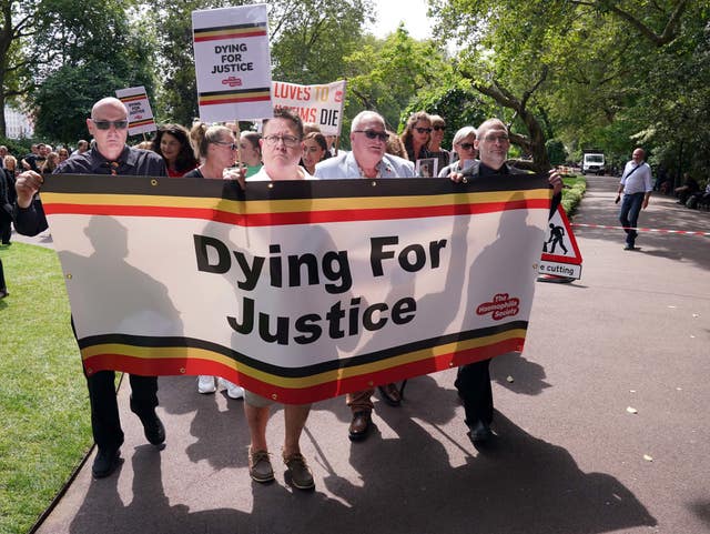 Campaigners gather in Westminster, London, calling for compensation for victims to be authorised by Prime Minister Rishi Sunak.