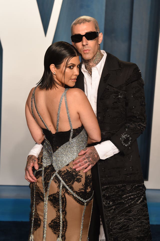 Kourtney Kardashian and Travis Barker attending the Vanity Fair Oscar Party held at the Wallis Annenberg Center for the Performing Arts in Beverly Hills, Los Angeles, California