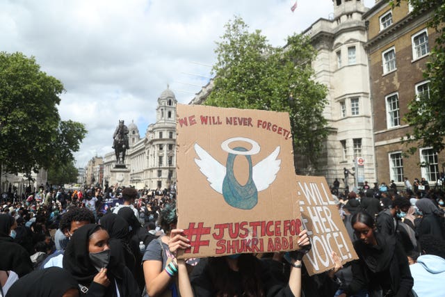 Crowds descended on Whitehall in a demonstration on the first anniversary of the death of Somalian child refugee Shukri Abdi (Yui Mok/PA)