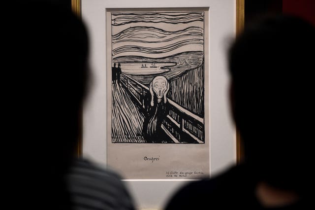 Art handlers during the installation of Edvard Munch's The Scream