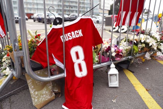 Tributes were left outside Bramall Lane following Cusack's death 