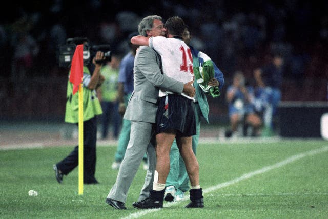 England’s Paul Gascoigne (right) hugs manager Bobby Robson (left) after England beat Cameroon to reach the 1990 World Cup semi-finals (Image: PA)