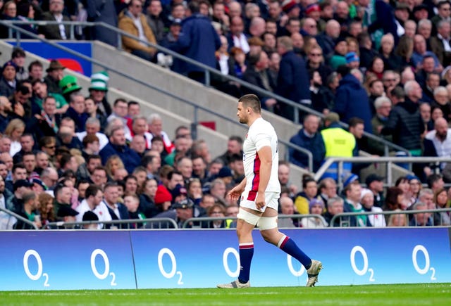 Charlie Ewels leaves the pitch after his red card